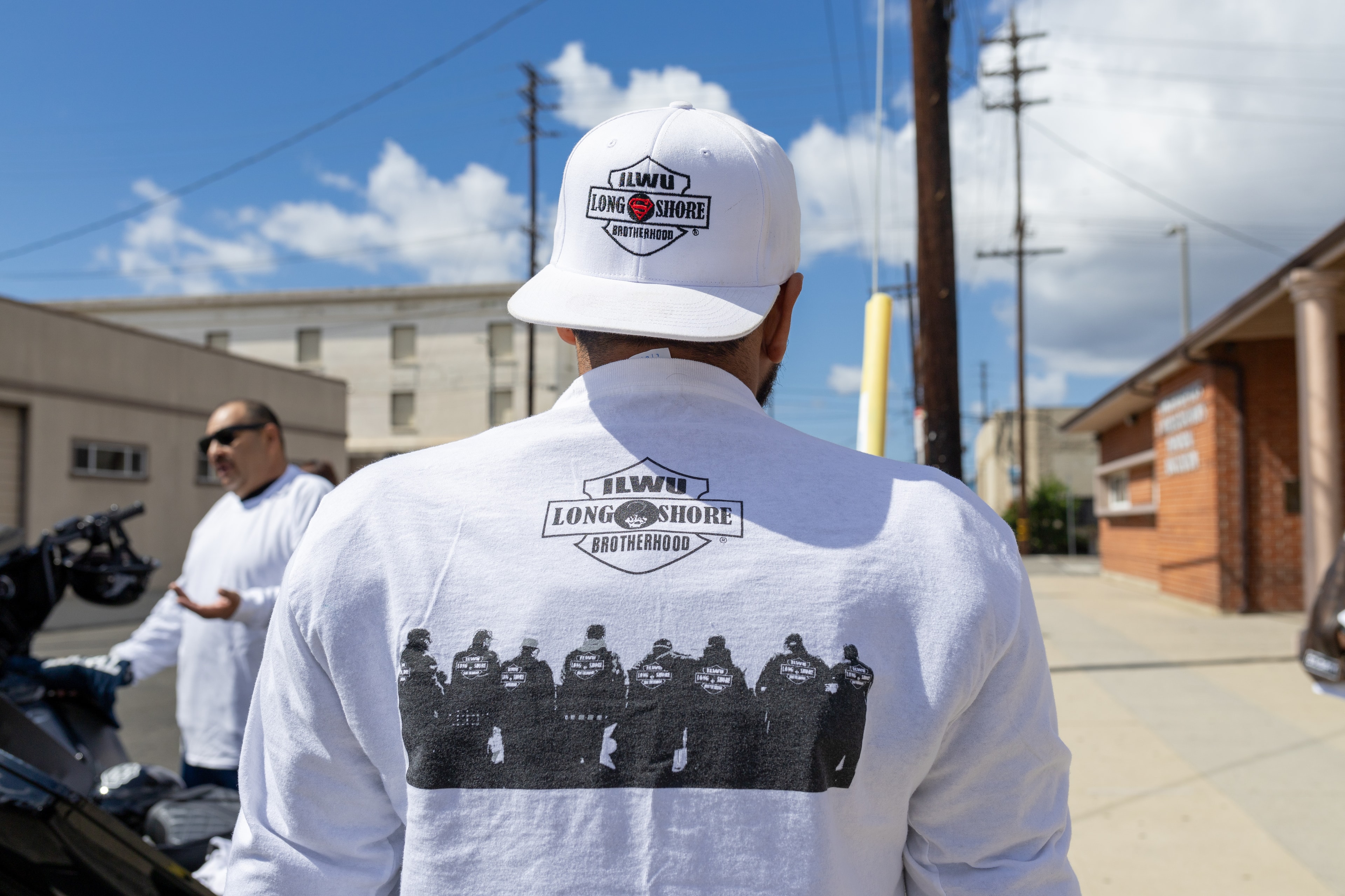 Man wearing Longshore Brotherhood shirt