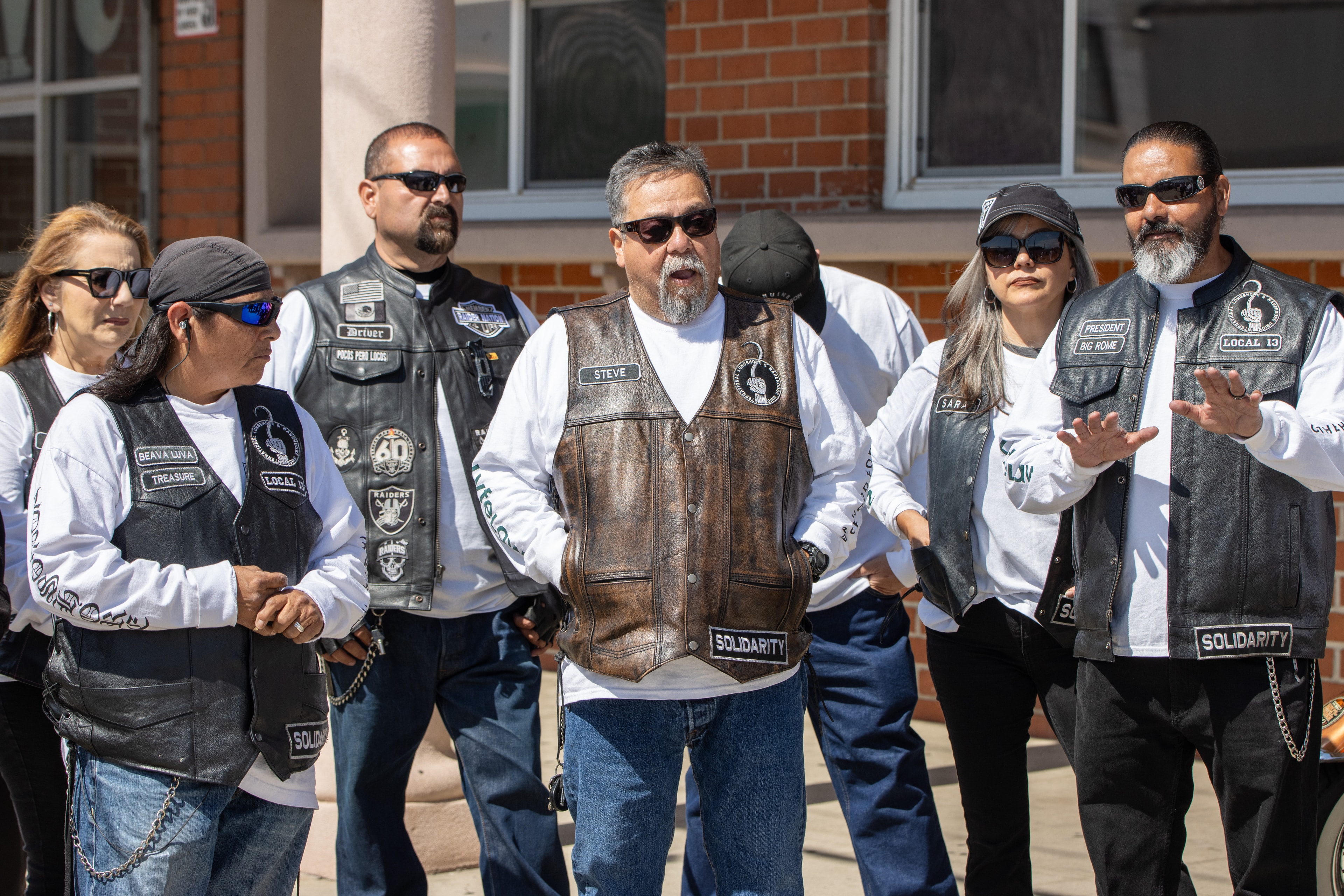 Longshore Brotherhood club members standing together outdoors